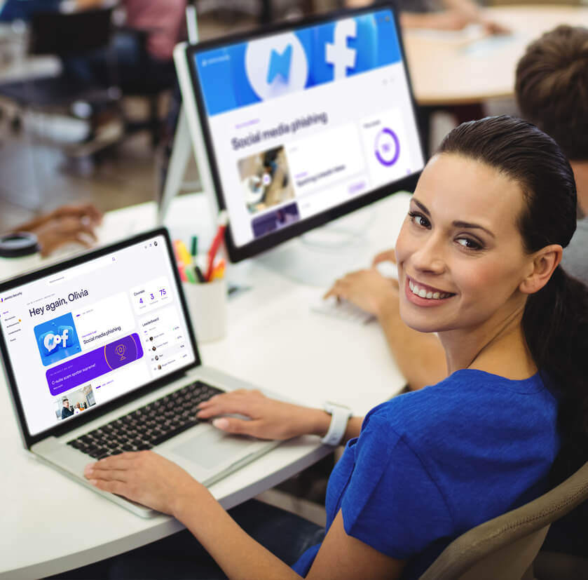 Femal employee using laptop to train on cybersecurity for tech companies