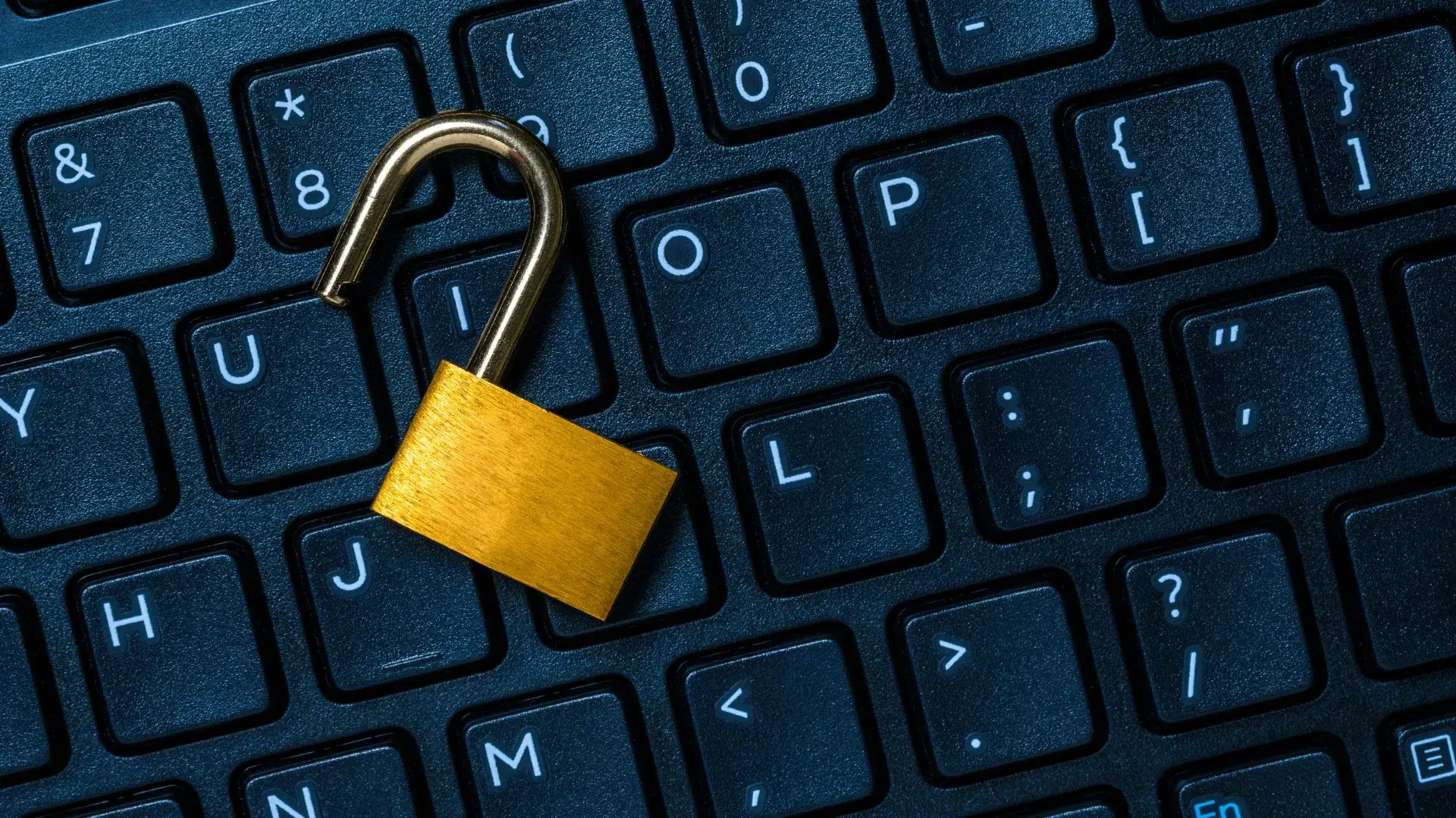 A padlock over a keyboard, symbolizing cyber security